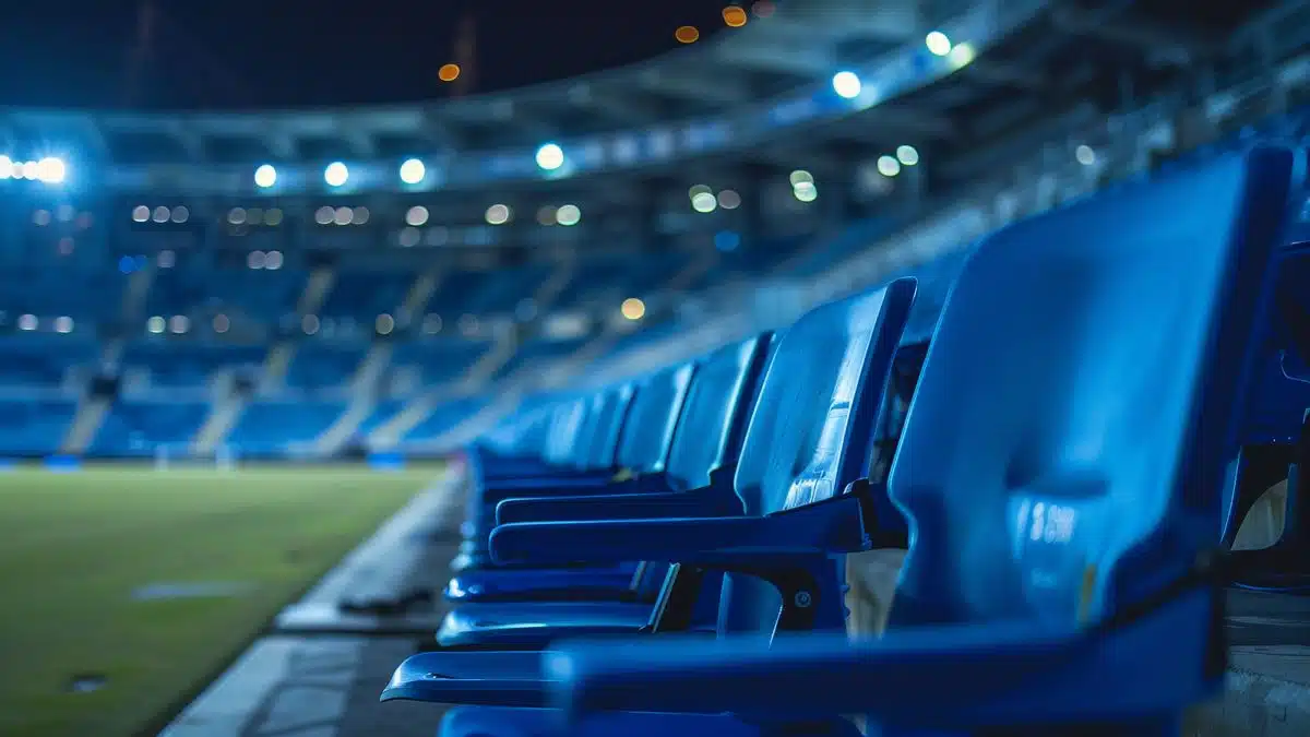 Empty stadium seats during an Olympic football match.